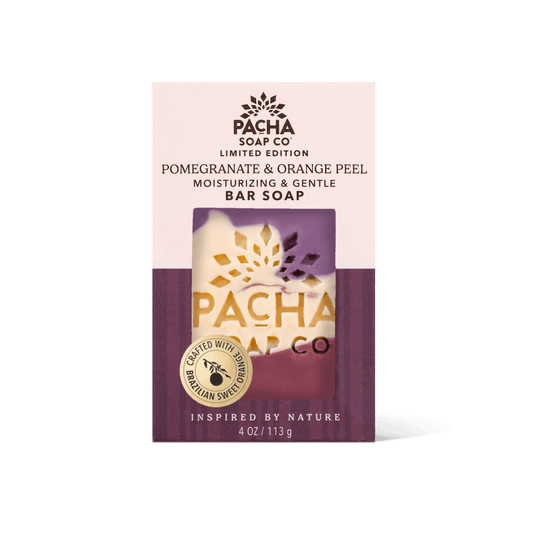 Pacha Soap Co. Limited Edition Pomegranate & Orange Peel Bar Soap in its retail packaging, featuring a cream and deep purple box with a clear window showing the bar soap inside.