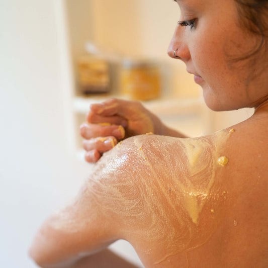 Person using Vanilla Almond Whipped Soap + Scrub in the shower