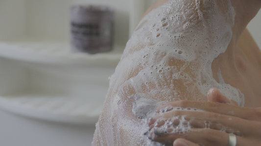 Person using Pacha Soap products in the bath tub