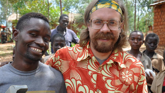 Image of two men smiling