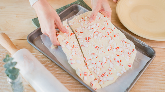 Image of person breaking up Peppermint bark