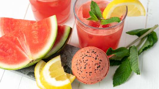 Image of Watermelon Lemonade Froth Bomb, glass of Watermelon Lemonade and slices of watermelon