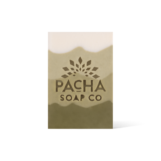 A 4 Tiered bar soap, ranging from cream and gradients down to a dark green. The Pacha Soap Co. Logo is placed in the middle.