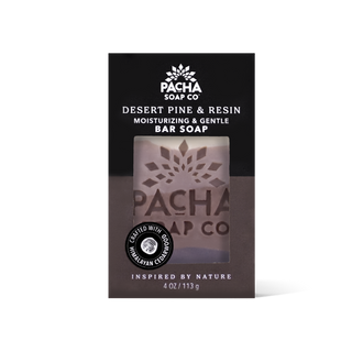 Pacha Soap Co Vetiver & Hinoki Moisturizing & Gentle Bar Soap packaging, featuring a black and dark brown design with a central window displaying the brown bar of soap inside.

