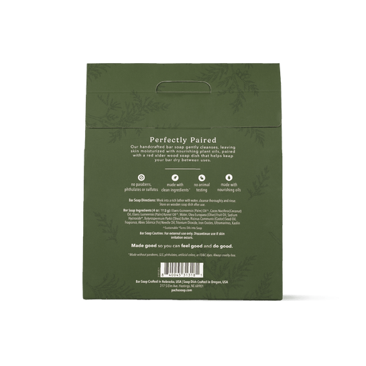 The back of Pacha Soap's Balsam & Pine Bar Soap Dish set, in a dark olive green packaging bag for 'Perfectly Paired' skin moisturizer, featuring product details, ingredients, and a barcode on a white background.