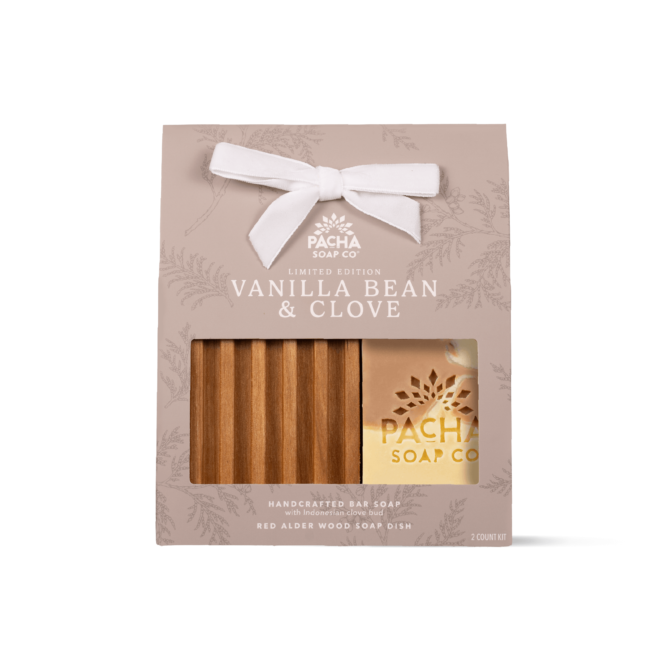 Pacha Soap Co. Vanilla Bean & Clove limited edition gift set in a beige bag with a white bow, showing one Vanilla Bean & Clove bar soap and a wooden soap dish through a clear window.