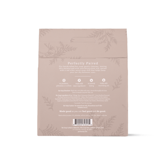 The back of Pacha Soap's Vanilla Bean & Clove Bar Soap & Dish Set beige bag package, featuring product details, ingredients, and a barcode on a clean white background