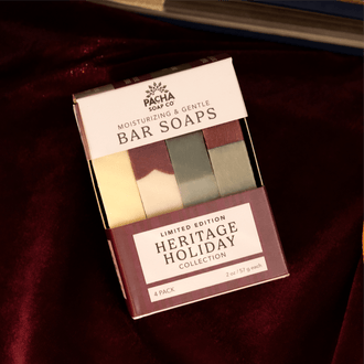 Front of Pacha Soap Co's Bar Soap Set with a window showing the barsoaps. The Set is sat on a deep red velvet fabric.