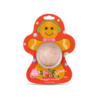 Pacha Soap's Red and colorful snowflake decorated Sweet Ginger bread bath bomb card, branded as Pacha soap kids and sugar & spice scented. 