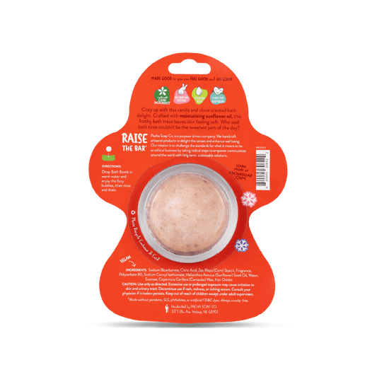 Pacha Soap's Red and colorful snowflake decorated Sweet Ginger bread bath bomb card, branded as Pacha soap kids and sugar & spice scented, showing product information such as ingredient list and product promises. 