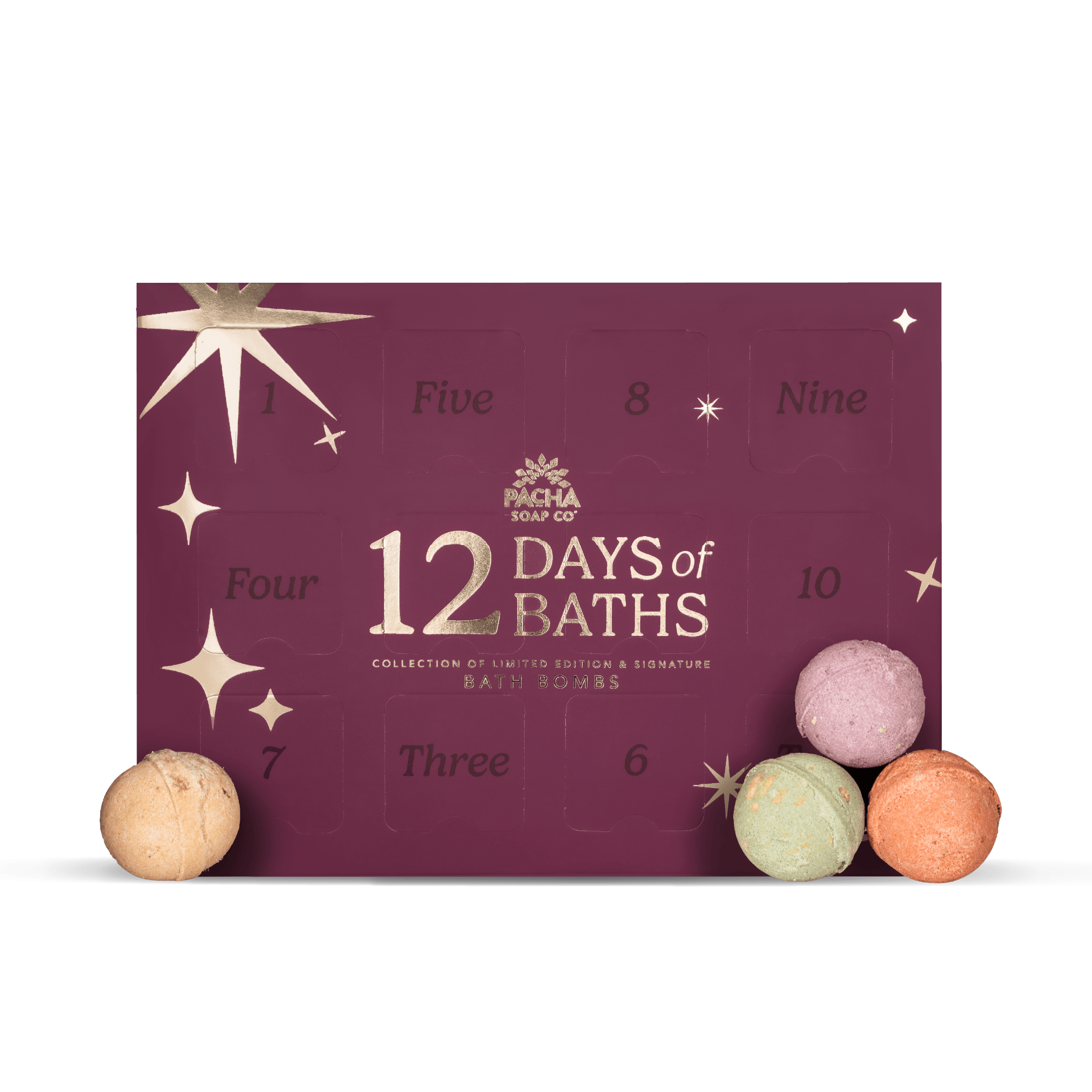 A 12 Days of Baths advent box by Pacha Soap Co. in deep burgundy with gold star and number cutouts, shown with four pastel bath bombs in front on a white background.
