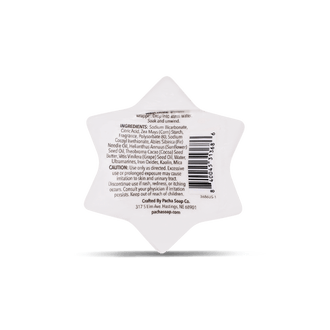 Pacha Soap's Sparkly Snowflake Shaped Balsam & Pine Bath Bomb in shrink wrap and in a back facing view, showing product information.
