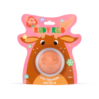 Pacha soap Kid's Ruby Red Reindeer shaped pink bath bomb card, decorated with colorful snowflakes. Specifies that this bath bomb is wild strawberry scented.