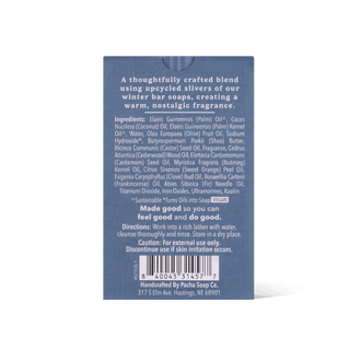 The back of a blue bar soap packaging box, showing product description, ingredients, directions, barcode, and Pacha Soap Co. branding