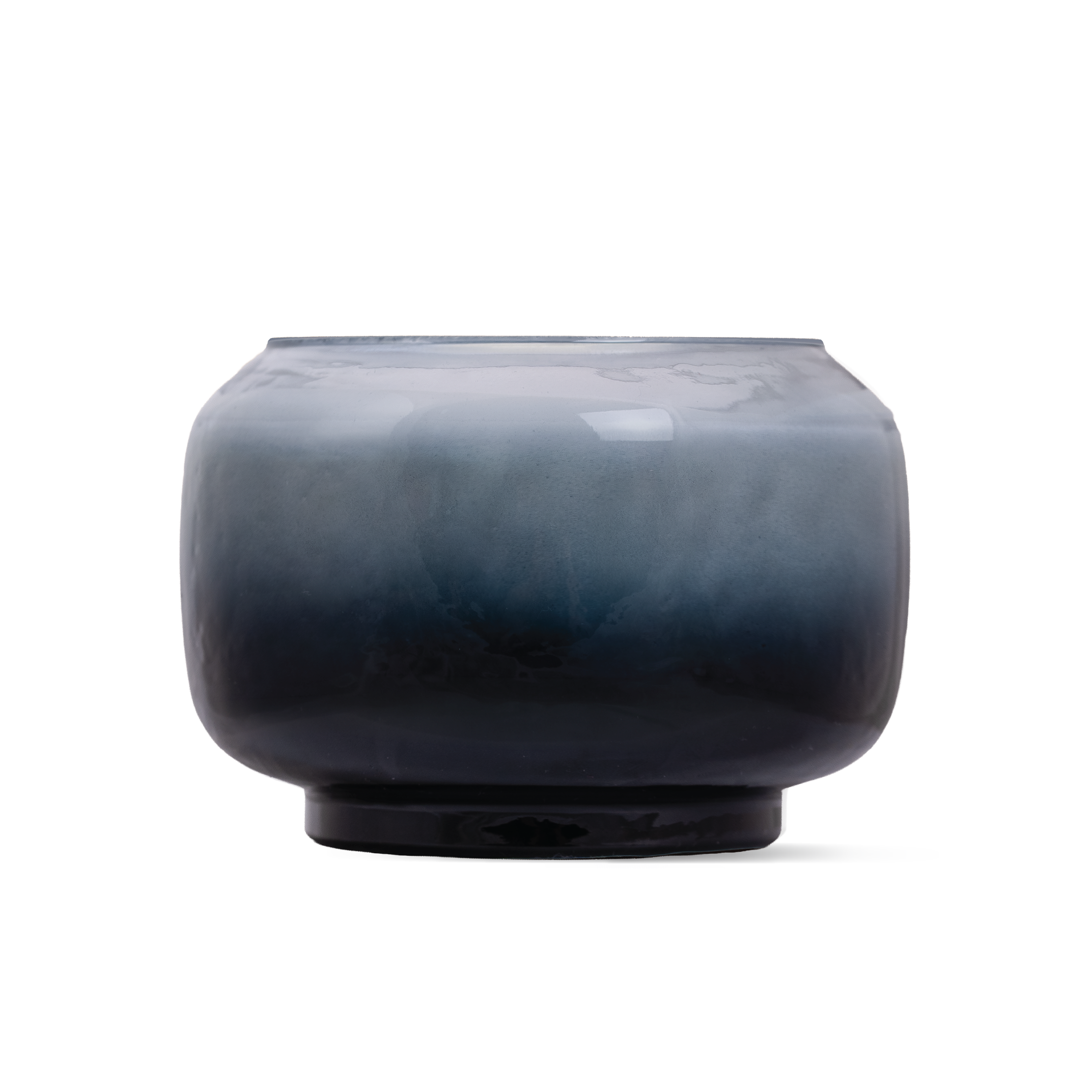 A round glass candle with a smooth gradient finish transitioning from light blue at the top to deep navy blue at the base